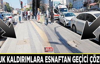 Bozuk kaldırımlara esnaftan geçici çözüm…