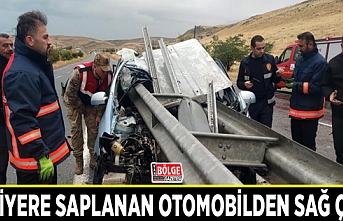 Sürücü, bariyere saplanan otomobilden sağ çıktı